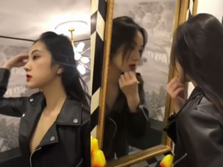 Asian beauty applying makeup