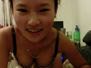 Cute asian school girl teasing and oral sex