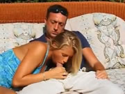 Blonde lover sex on garden sofa